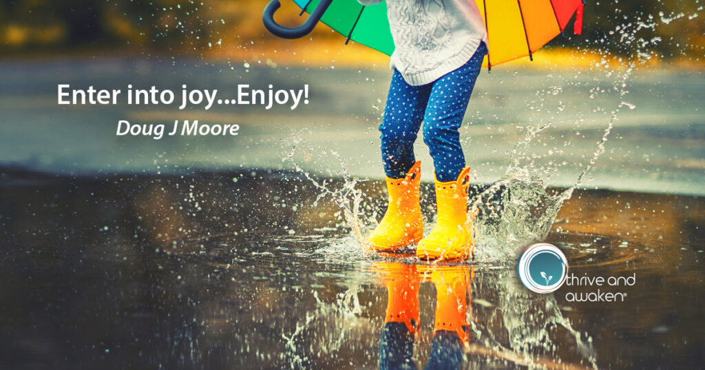 Child splashing in a puddle with the saying: Enter into Joy-Enjoy!